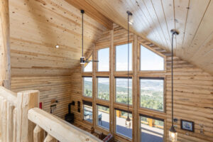 Custom Log Home inside with beautiful big windows